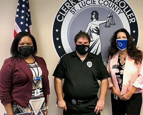 Civil Manager over guardianship Courtney Dandridge, (left) and co-chair of SDM4FL Michael Lincoln-McCreight, (center) with St. Lucie County Clerk and Comptroller Michelle R. Miller. 